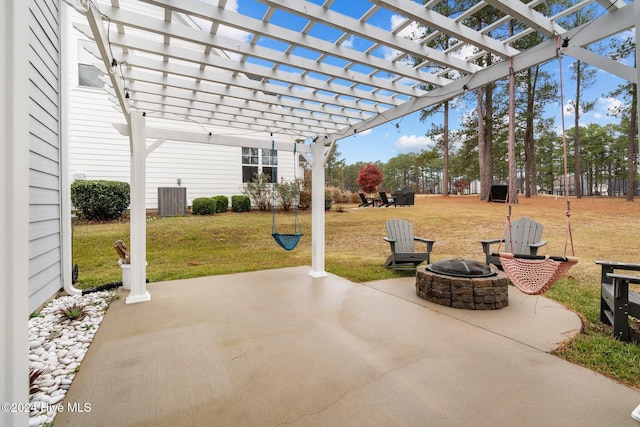 view of patio with a fire pit, central AC unit, and a pergola