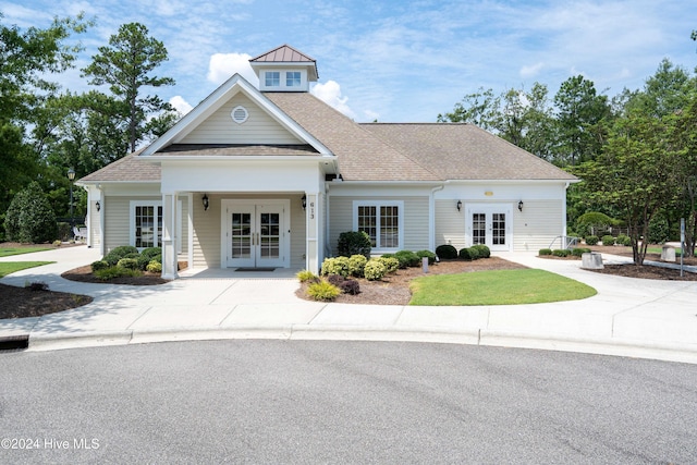 view of front facade featuring french doors