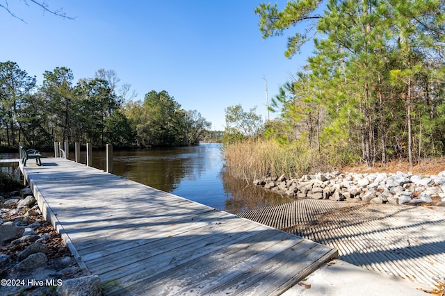 view of dock featuring a water view