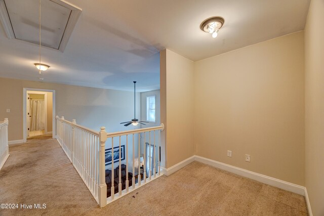 270 Hydrangea Ln, Hampstead, NC 28443 - hallway with attic access, carpet flooring, and baseboards