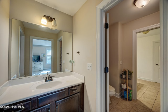 270 Hydrangea Ln, Hampstead, NC 28443 - bathroom with toilet, vanity, and tile patterned floors