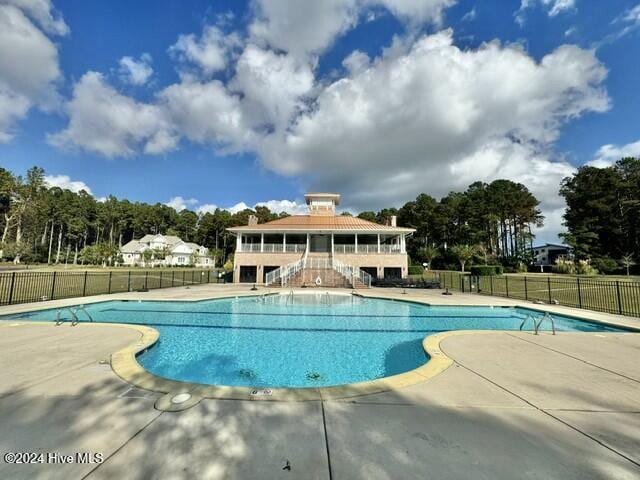 270 Hydrangea Ln, Hampstead, NC 28443 - community pool featuring stairway and a patio area