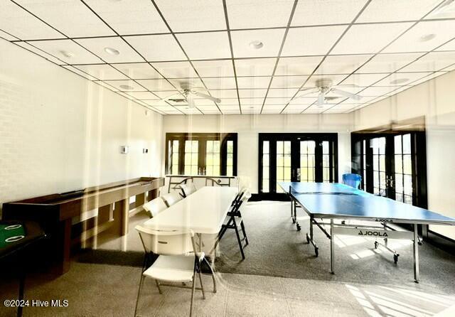 270 Hydrangea Ln, Hampstead, NC 28443 - game room featuring ceiling fan, french doors, and plenty of natural light