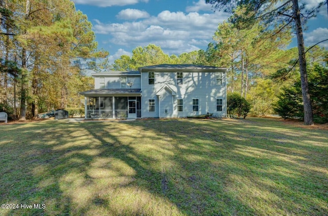 270 Hydrangea Ln, Hampstead, NC 28443 - view of front of house featuring a sunroom and a front yard