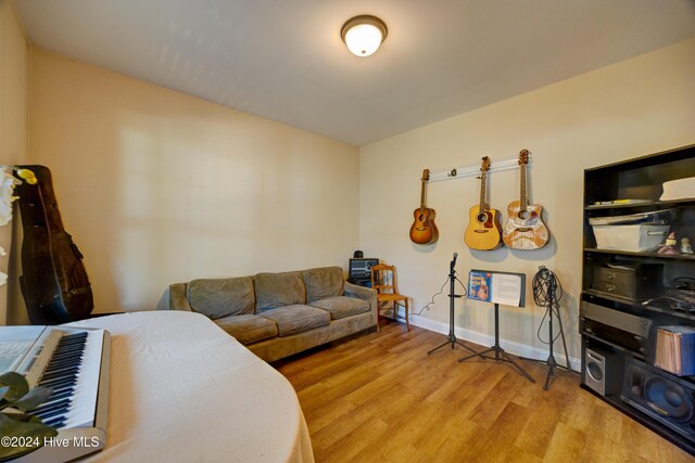 270 Hydrangea Ln, Hampstead, NC 28443 - living room with light wood finished floors and baseboards
