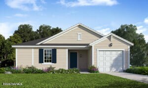 view of front facade with a garage and a front lawn