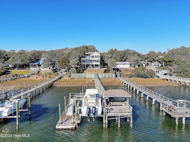 dock area featuring a water view