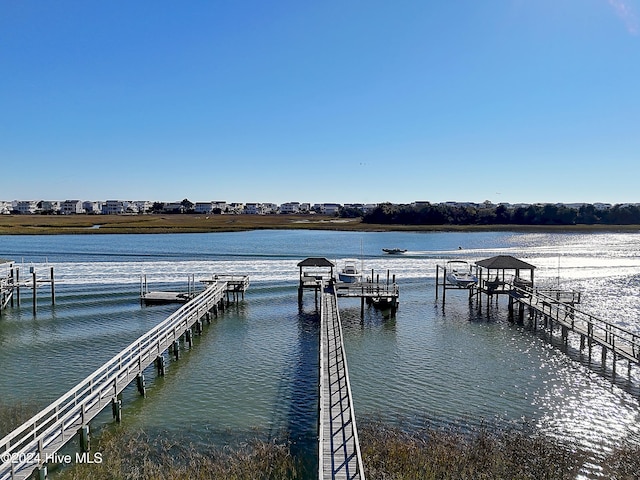 dock area featuring a water view