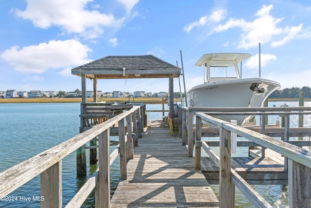 view of dock with a water view