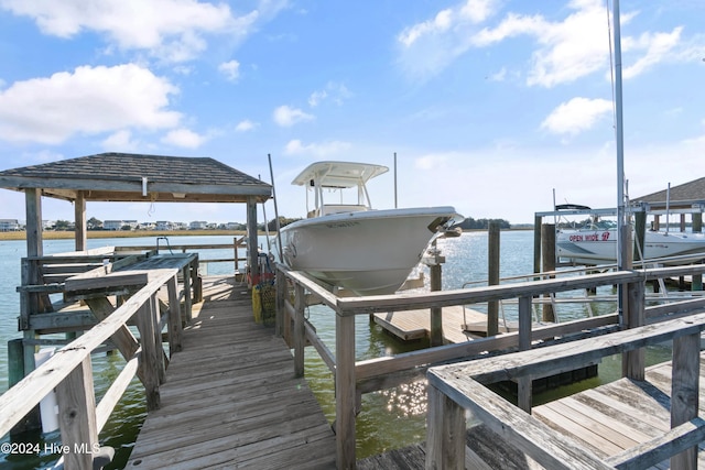 view of dock with a water view