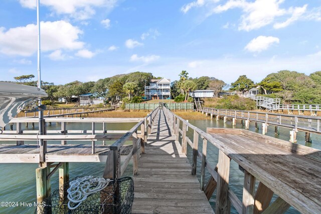 view of dock with a water view