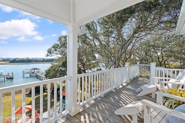 deck featuring a water view