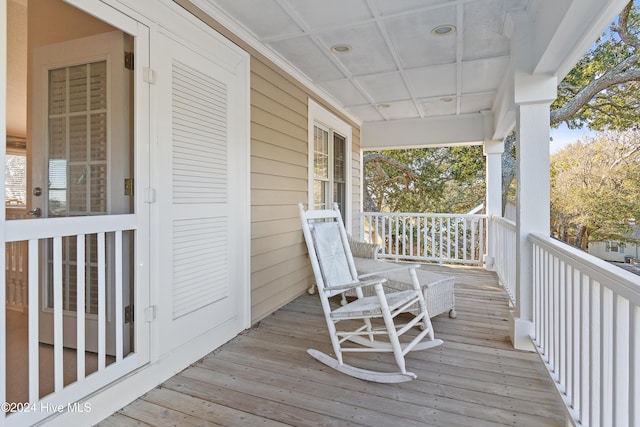 wooden deck featuring a porch