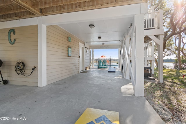 view of patio / terrace with a carport