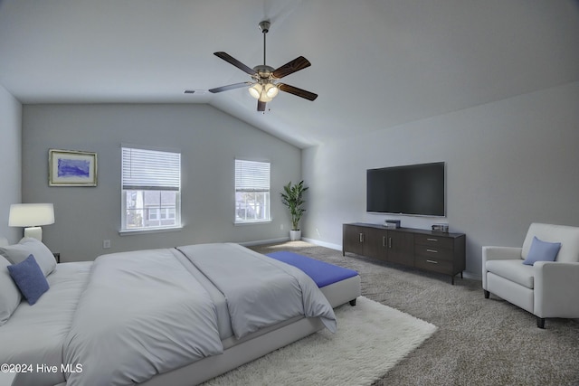 bedroom featuring ceiling fan, lofted ceiling, and carpet floors