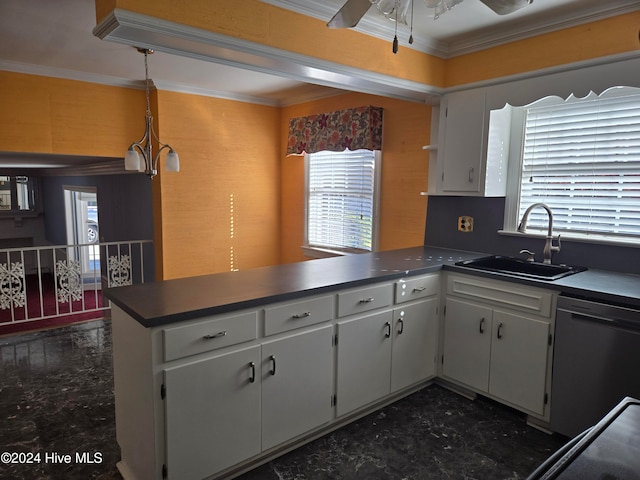 kitchen featuring stainless steel dishwasher, white cabinetry, and sink