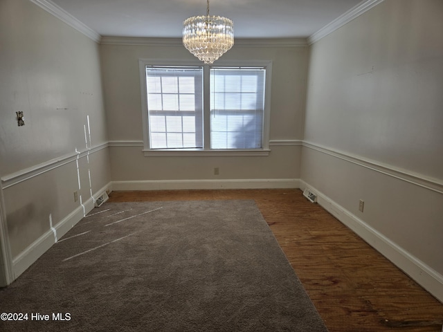 1112 Laurel Ln NW, Wilson, NC 27896 - unfurnished room with a chandelier, crown molding, wood finished floors, and baseboards