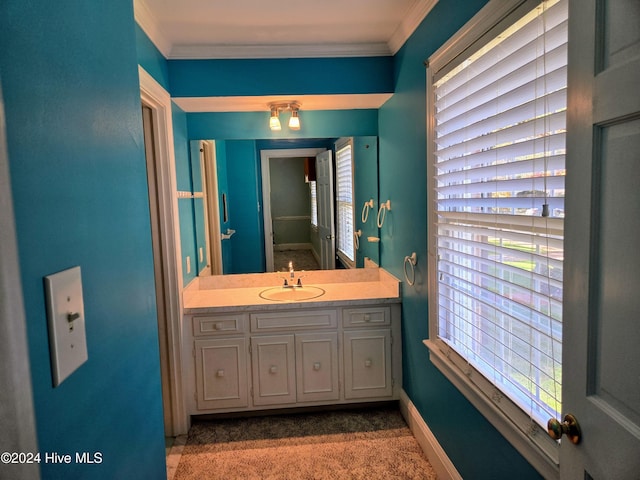 1112 Laurel Ln NW, Wilson, NC 27896 - bathroom featuring ornamental molding, vanity, and baseboards