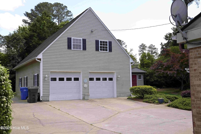 1112 Laurel Ln NW, Wilson, NC 27896 - view of side of property featuring driveway and an attached garage