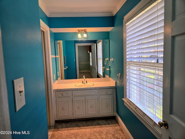 bathroom featuring vanity and ornamental molding