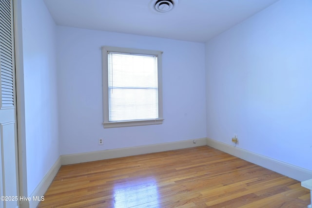 1112 Laurel Ln NW, Wilson, NC 27896 - unfurnished room with light wood-style flooring and baseboards