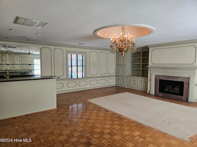 unfurnished living room featuring dark parquet flooring and an inviting chandelier