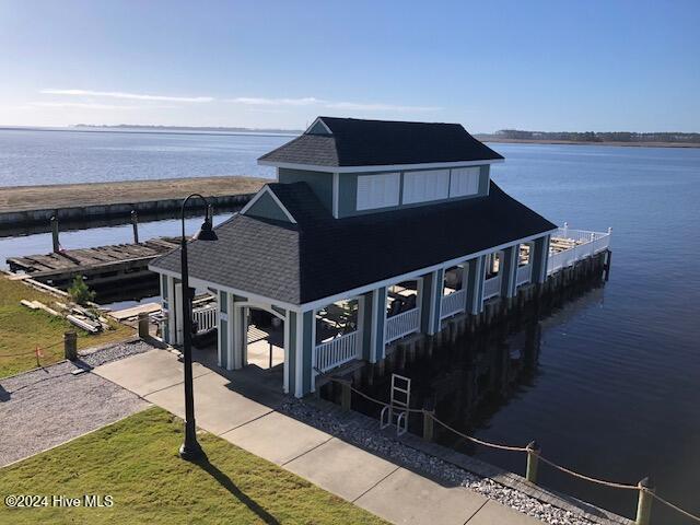 exterior space with a water view