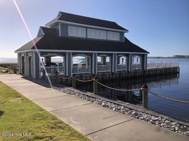 view of front of home featuring a water view