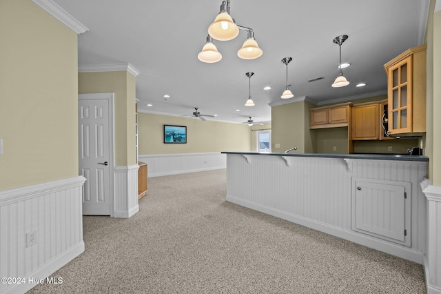 kitchen with a kitchen breakfast bar, crown molding, pendant lighting, and light carpet