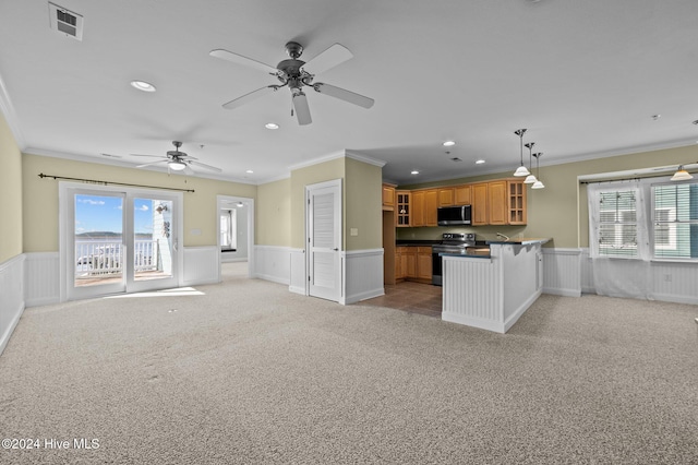 kitchen featuring stainless steel appliances, kitchen peninsula, crown molding, pendant lighting, and light carpet