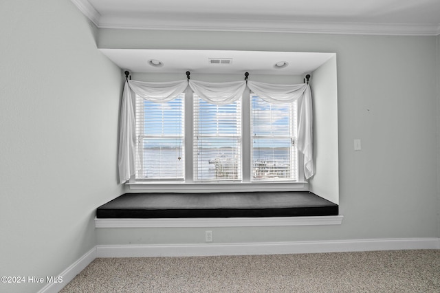 details featuring crown molding and carpet floors