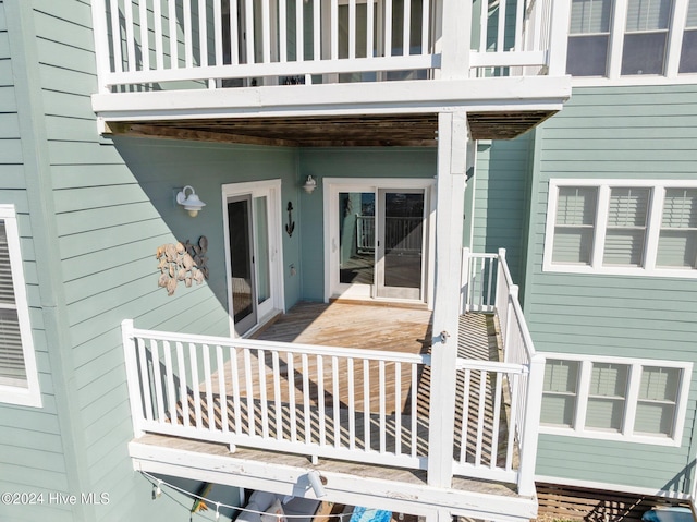 doorway to property featuring a balcony