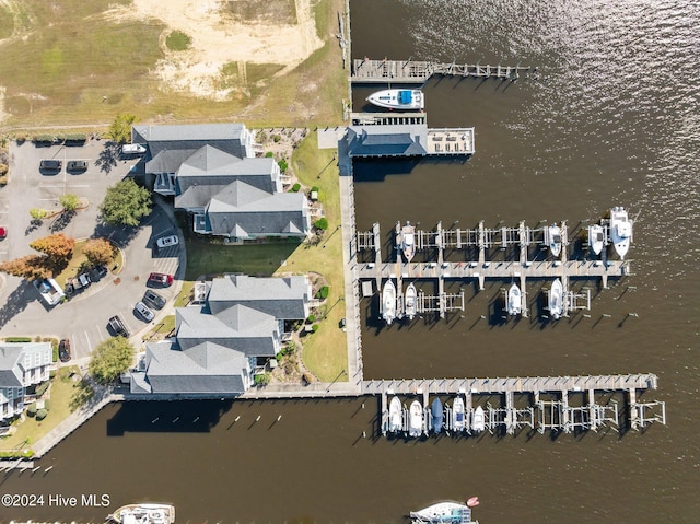 birds eye view of property featuring a water view