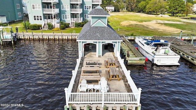 dock area featuring a gazebo and a water view