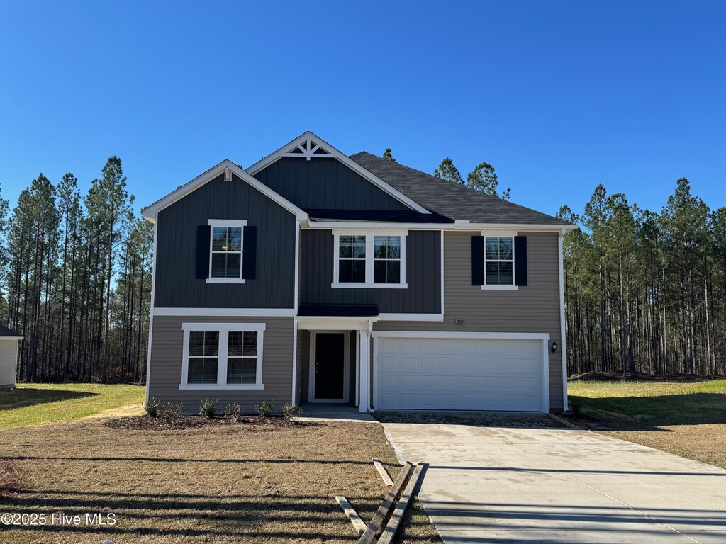 view of front of home with a garage