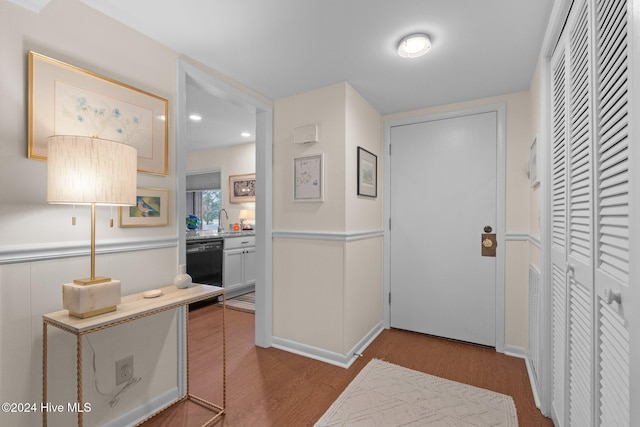 interior space featuring sink and light wood-type flooring