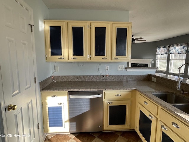 kitchen with ceiling fan, dishwasher, and sink