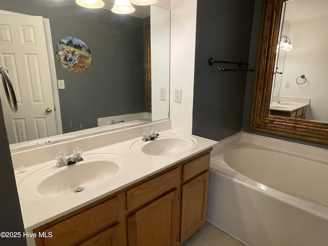 bathroom with vanity and a tub to relax in