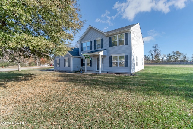 view of front of home featuring a front lawn