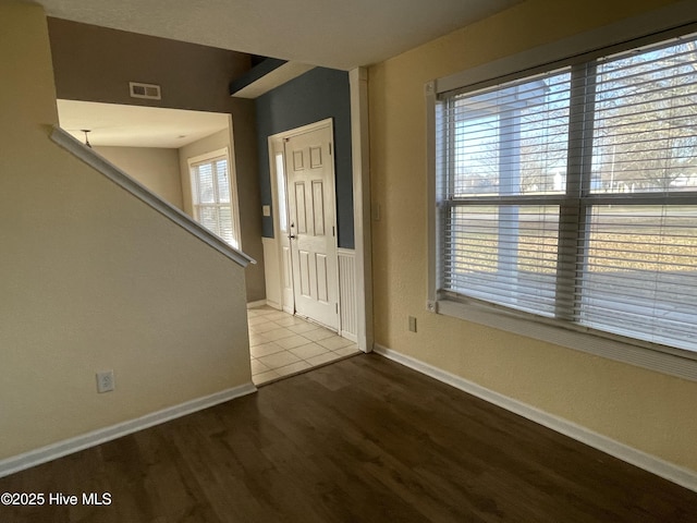 entryway with light hardwood / wood-style flooring