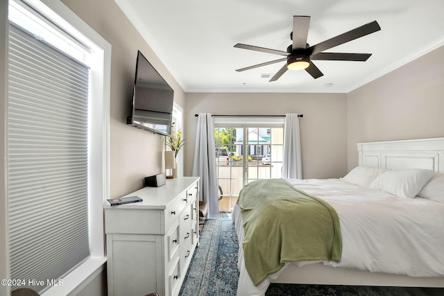 bedroom with ceiling fan and crown molding