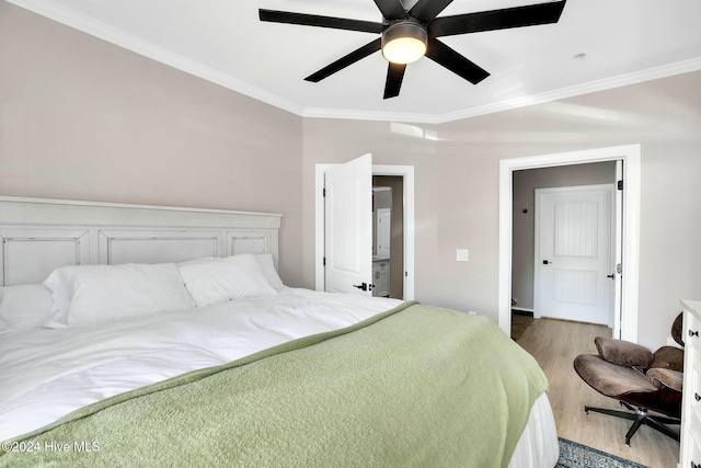 100 Gateway Condos Dr Unit 110, Surf City, NC 28445 - bedroom featuring ornamental molding, light wood-style flooring, a ceiling fan, and baseboards