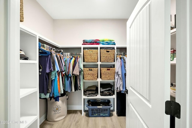 100 Gateway Condos Dr Unit 110, Surf City, NC 28445 - spacious closet featuring wood finished floors