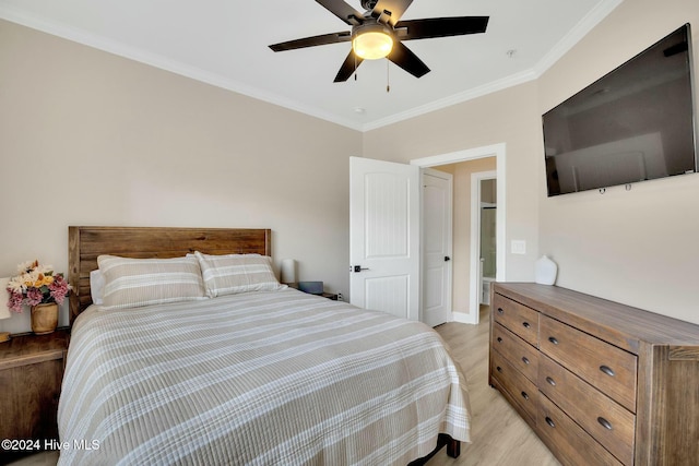 100 Gateway Condos Dr Unit 110, Surf City, NC 28445 - bedroom with ornamental molding, light wood-style floors, ceiling fan, and baseboards