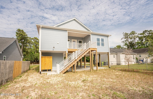 117 NW 17th St, Oak Island, NC 28465 - back of property with stairs