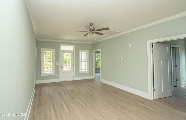 117 NW 17th St, Oak Island, NC 28465 - unfurnished room featuring ornamental molding, baseboards, light wood-type flooring, and a ceiling fan