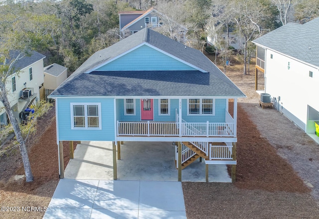 view of front of property with central AC unit and covered porch