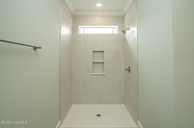 117 NW 17th St, Oak Island, NC 28465 - bathroom featuring tiled shower, crown molding, and baseboards