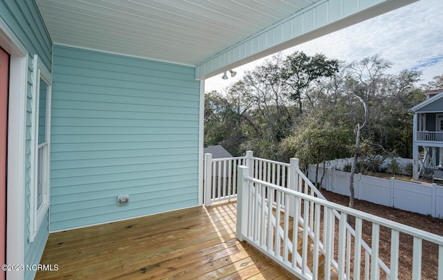 wooden balcony featuring a deck