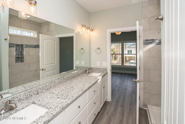 bathroom featuring vanity and hardwood / wood-style flooring